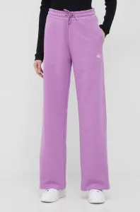 Bavlněné tepláky Calvin Klein Jeans fialová barva