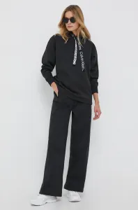 Tepláky Calvin Klein Jeans černá barva, hladké
