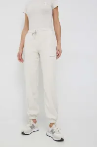 Tepláky Calvin Klein Jeans dámské, béžová barva, s aplikací #5447404