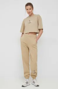 Tepláky Calvin Klein Jeans dámské, béžová barva, s potiskem