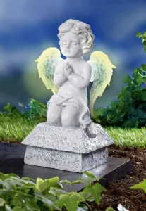 Die moderne Hausfrau Modlící se anděl se svítícími křídly