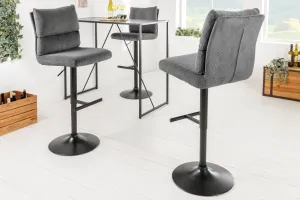 Estila Industriální otoční barová židle Kelsy v tmavě šedé barvě se sametovým potahem a černou polohovatelnou nohou 100-121 cm