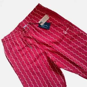 Tepláky Karl Kani Small Signature Ziczac Pinstripe Relaxed Fit Sweatpants dark red/off white #5075990