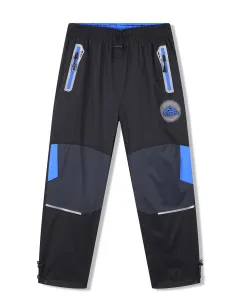 Chlapecké šusťákové kalhoty - KUGO SK7751, černá / modré zipy Barva: Černá, Velikost: 128