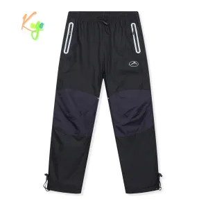 Chlapecké šusťákové kalhoty, zateplené - KUGO DK8237, černá / černé zipy Barva: Černá, Velikost: 134