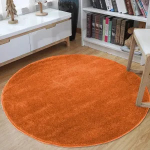Okrúhly koberec v oranžovej farbe #3530320