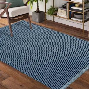 Modrý protiskluzový koberec vhodný do předsíně #2134601