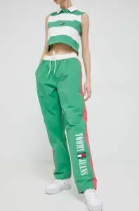 Tepláky Tommy Jeans zelená barva, vzorované