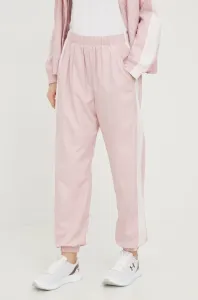 Tréninkové kalhoty Under Armour dámské, růžová barva, hladké